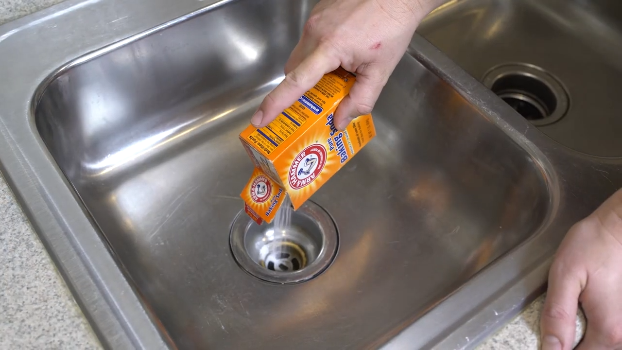 baking soda and a mild abrasive cleans sink drains well