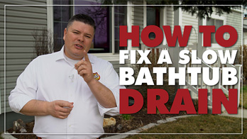 A man stands outside a house with the text "How to Fix a Slow Bathtub Drain" in large red and white letters beside him.