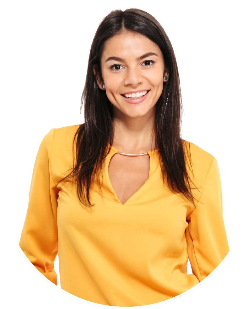 Woman in a yellow shirt smiling at the camera