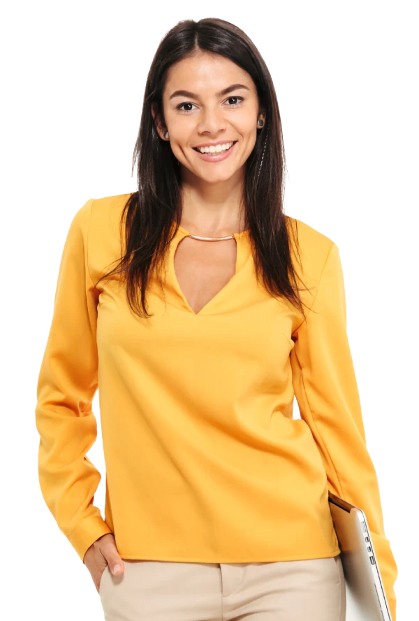 Woman in a yellow shirt smiling at the camera