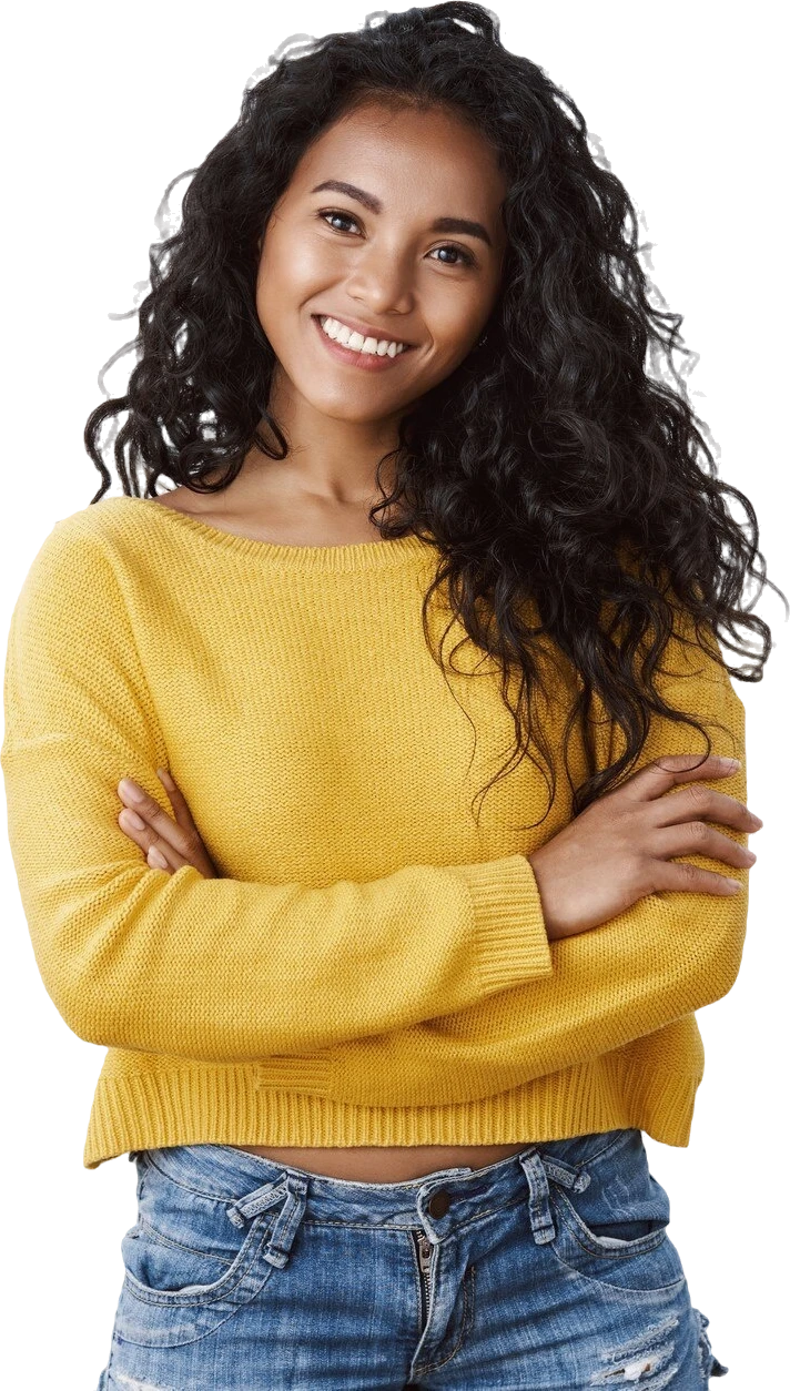 attractive african american woman curly haircut cross arms chest self assured powerful pose smiling determined wearing a yellow sweater