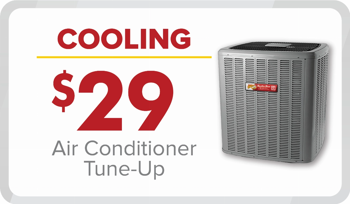 %Focuskw% | Any Hour Services Advertisement showing "$29 Air Conditioner Tune-Up" with an image of an air conditioning unit and the word "COOLING" in large red text. Take advantage of our July 2024 promotions and stay cool all summer!.