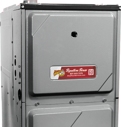 %Imagetitle% | Any Hour Services A gray metal furnace unit with a red and white service label on the front panel displays contact information for Any Hour Services, your trusted provider for HVAC and plumbing Utah residents rely on.