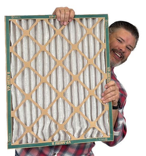 A man in a plaid shirt holds up a large, rectangular air filter with a diamond-shaped grid pattern against a black background, showcasing quality plumbing Utah solutions.